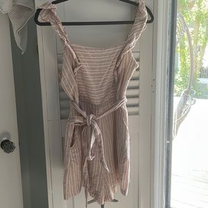 Ruffle sleeve tank top romper. Pink, red, cream, and blue striped.